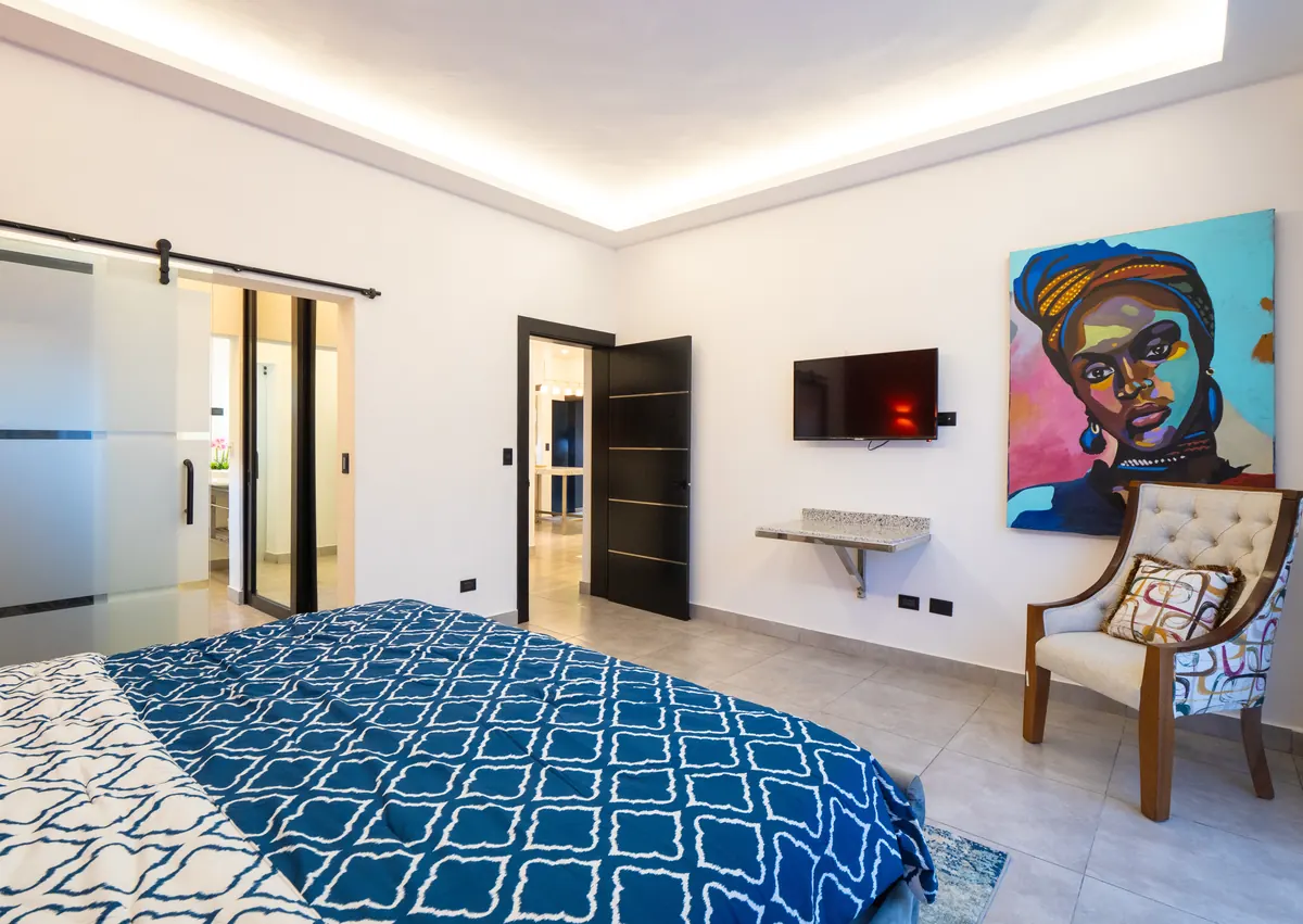 Bedroom of a one-bedroom apartment at Rizz Suites, Sosúa